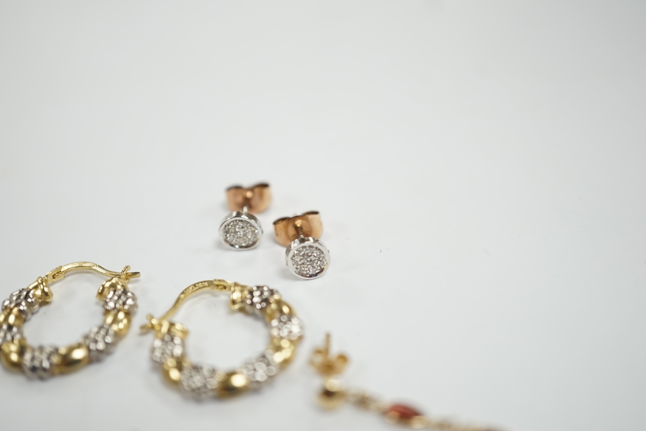 A pair of French 18k and cultured pearl drop earrings, 45mm and three other pairs to include 14k and diamond cluster, 9ct and garnet drop and two colour 10k.